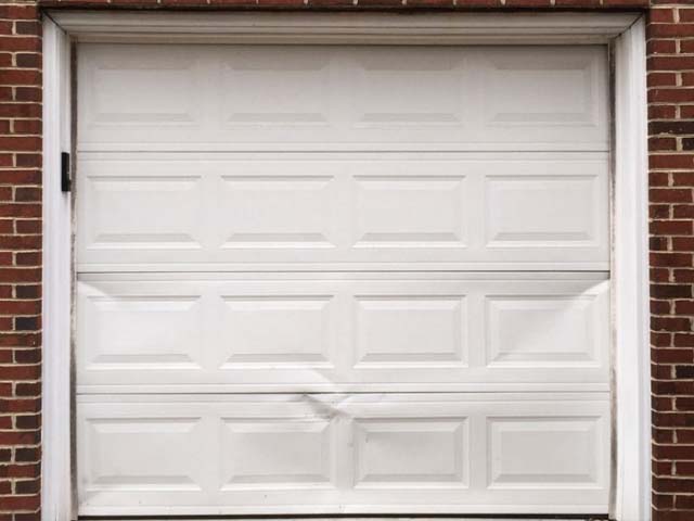 Fix a dented garage door